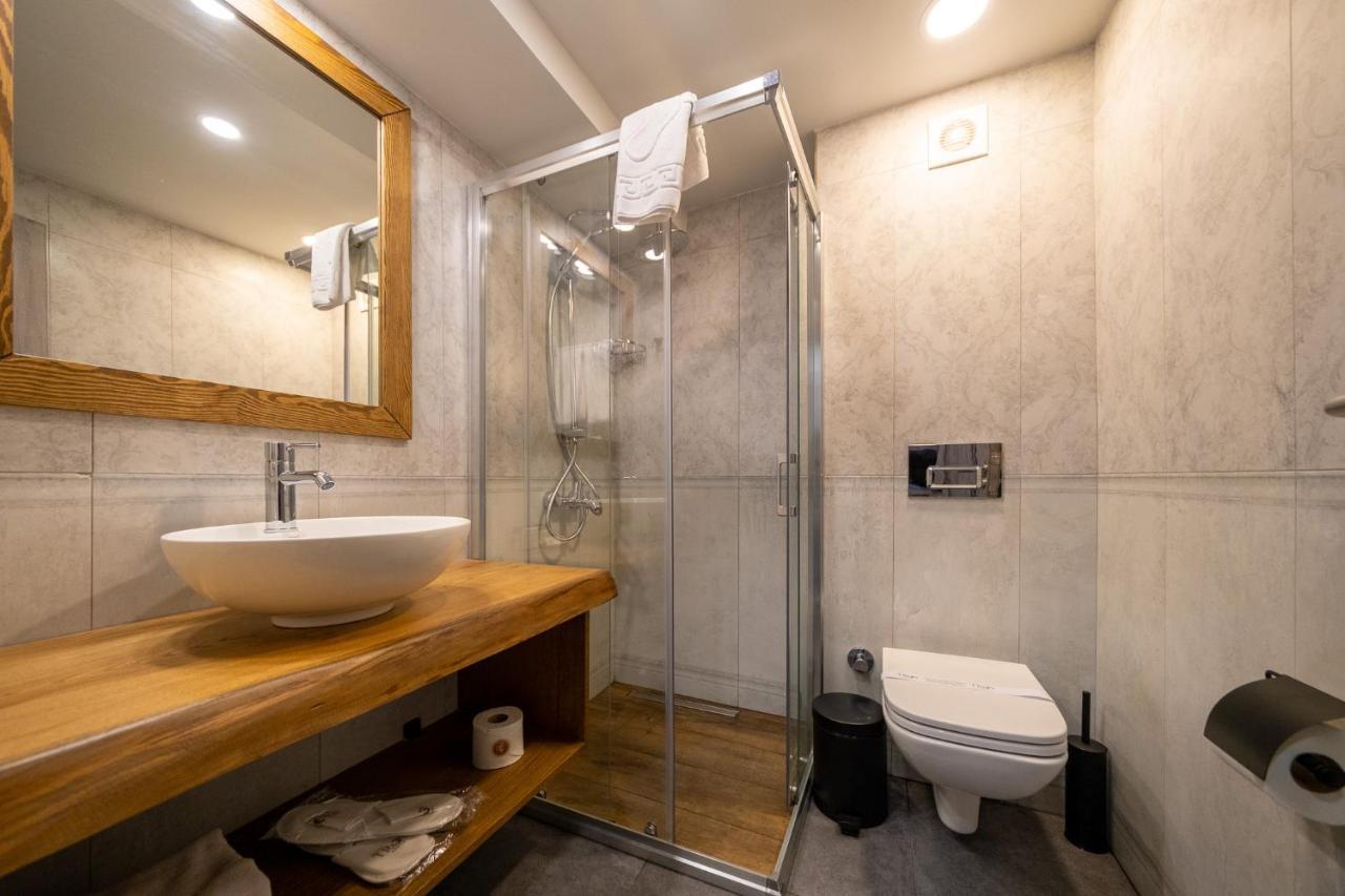 Assos Troy Port Hotel Bagian luar foto