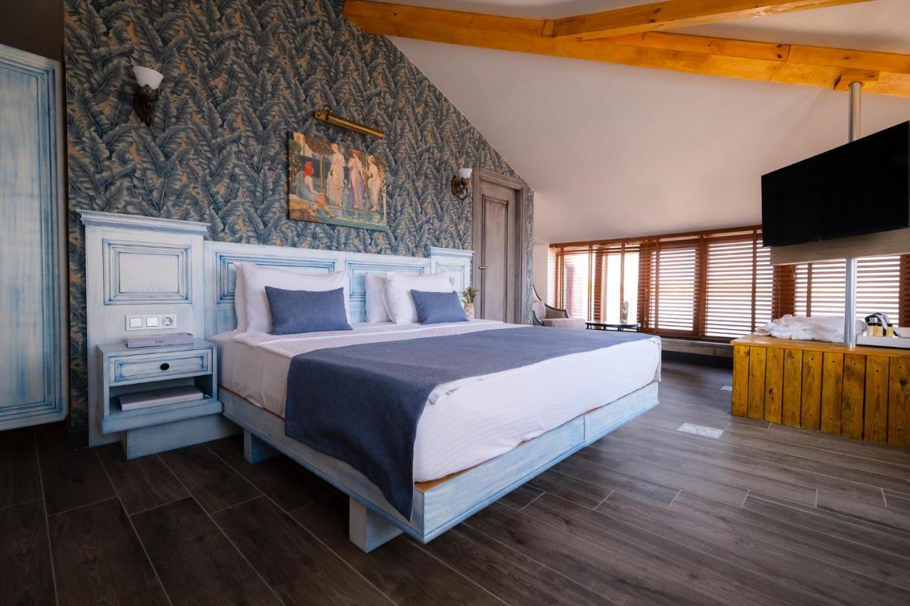 Assos Troy Port Hotel Bagian luar foto