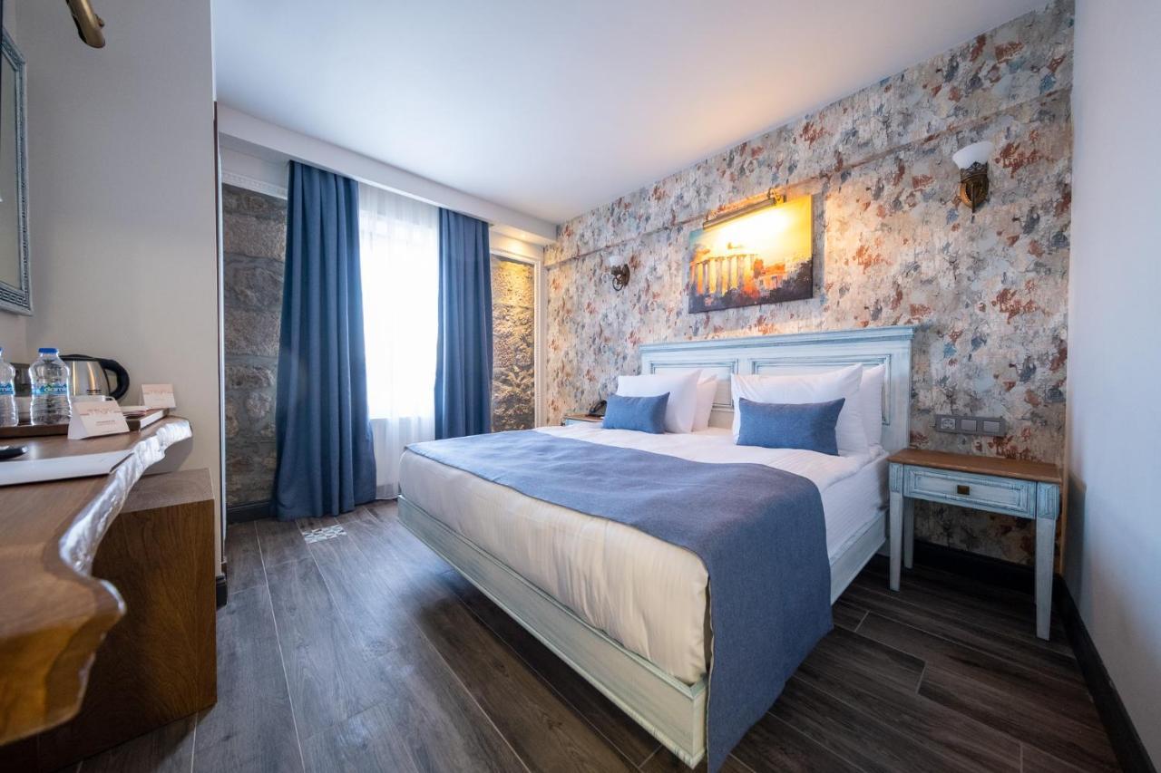 Assos Troy Port Hotel Bagian luar foto