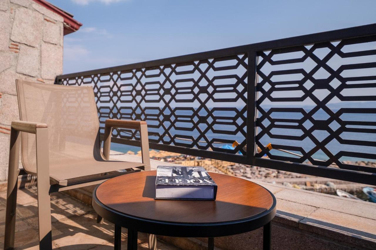 Assos Troy Port Hotel Bagian luar foto